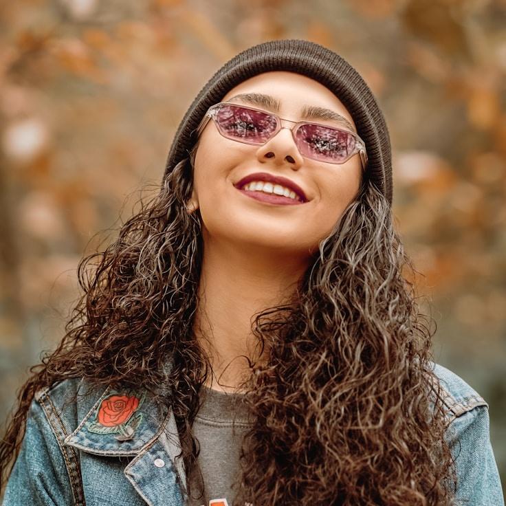 Kaveri Mehta, Lead Design Curator at Grove Passage Atlas, reviewing corporate floral arrangements